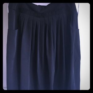 Pleated silk skirt with pockets